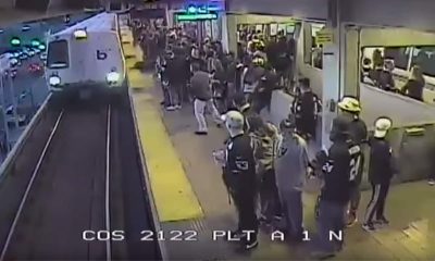 Photo of BART employee saving a man from the train