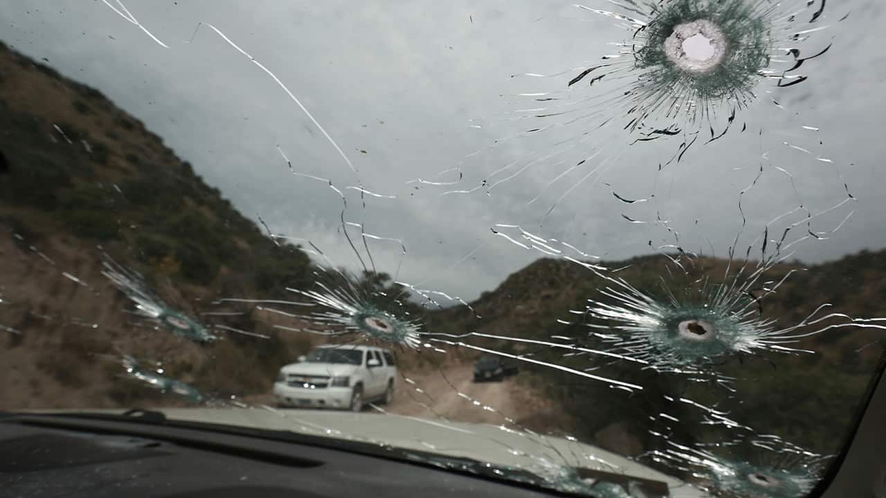 Photo of bullet-riddled vehicles