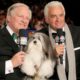 Photo of David Frei, left, and host John O'Hurley posing with a havanese dog