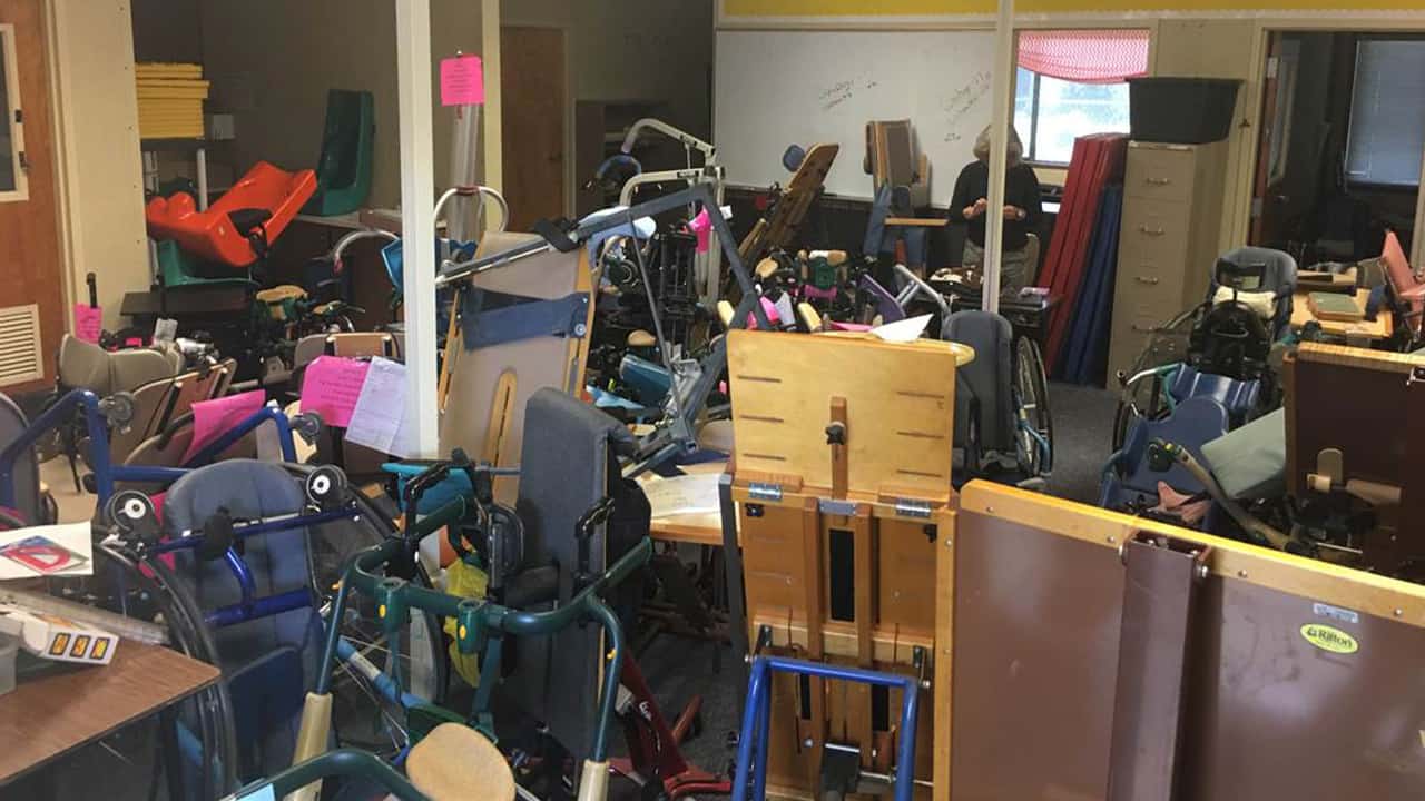 Photo of a special ed storage and teachers office at Figarden Elementary School before it was cleaned up.