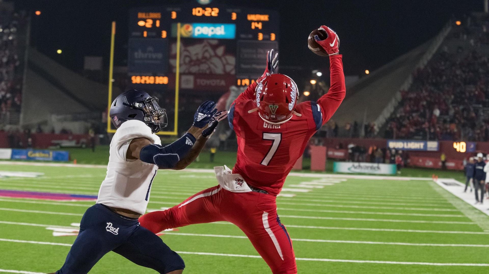 Photo of Derrion Grim catching a touchdown pass