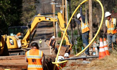 Photo of PG&E workers burrying utility lines