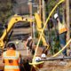 Photo of PG&E workers burrying utility lines