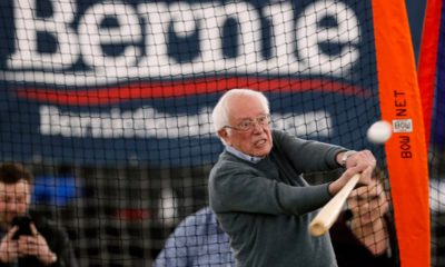 Photo of Sen. Bernie Sanders hitting a baseball