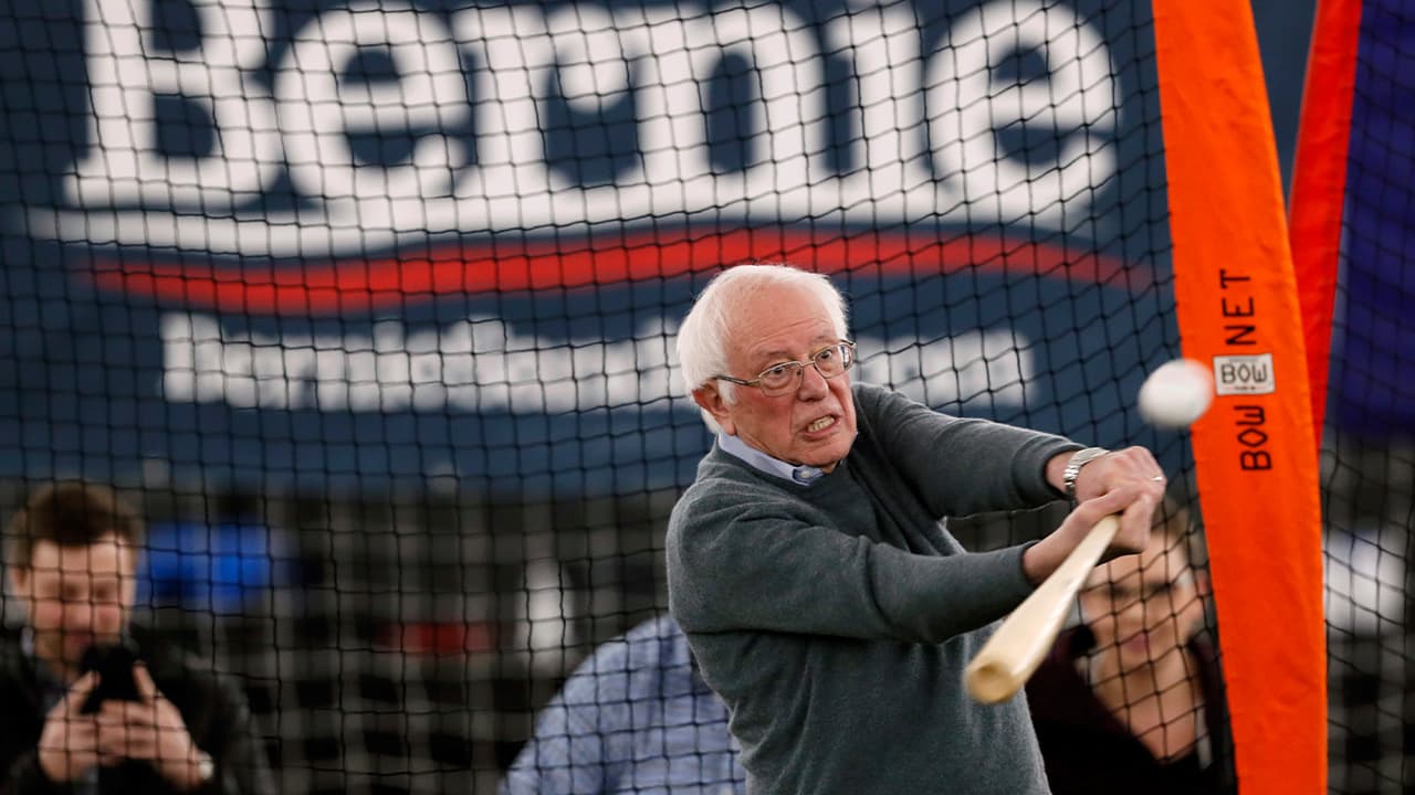 Photo of Sen. Bernie Sanders hitting a baseball