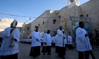 Photo of clergymen participating in Christmas celebrations in West Bank