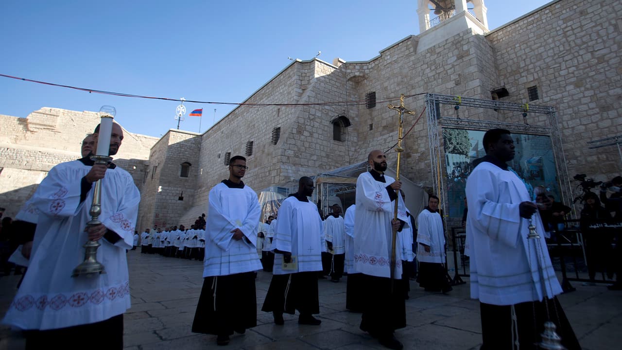 Photo of clergymen participating in Christmas celebrations in West Bank