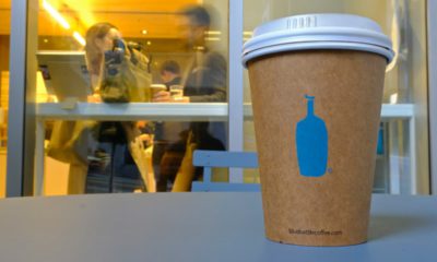 Photo of a Blue Bottle Coffee paper to-go cup