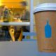 Photo of a Blue Bottle Coffee paper to-go cup