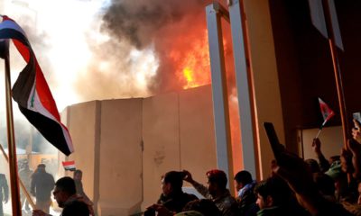 Photo of protestors attacking the U.S. Embassy in Iraq