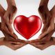 Picture of hands surrounding a heart symbolizing philanthropy