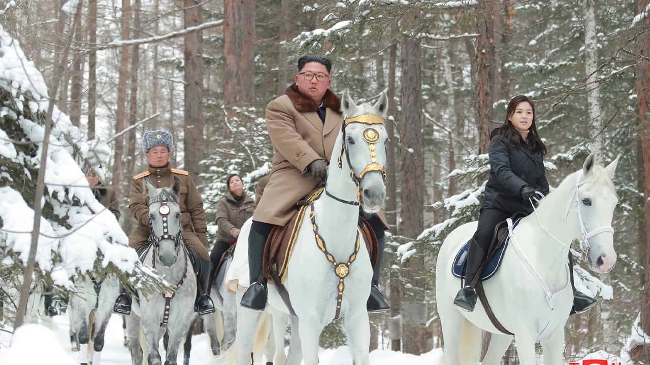 Photo of Kim Jong Un riding on a white horse