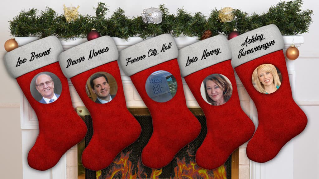 composite image of Christmas stockings and portraits of politicians