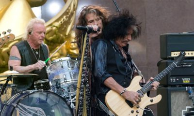 Photo of Aerosmith's Joey Kramer, Steven Tyler, and Joe Perry