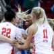 Photo of Fresno State women's basketball team celebrating a victoryta