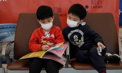 Photo of kids wearing masks to prevent an outbreak of a new virus in China