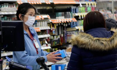 Photo of a sales clerk at a pharmacy in Chicago