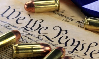Montage of Constitution and gold bullets signifying the Second Amerndment