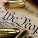 Montage of Constitution and gold bullets signifying the Second Amerndment