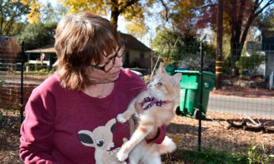 Photo of Elizabeth Watling holding her cat Tampopo