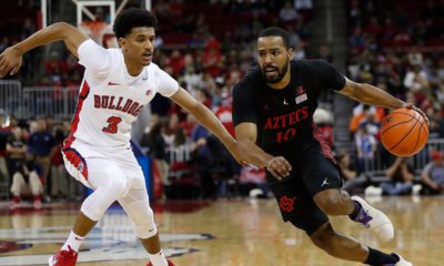 Photo of Fresno State's Jarred Hyder and San Diego State's KJ Feagin in game action