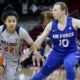 Photo of Bulldogs captain Aly Gamez dibbling past Air Force's Kamri Heath