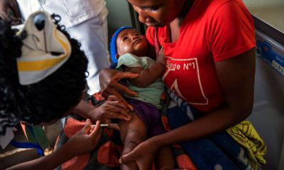 Photo of a Migowi child getting a malaria vaccine