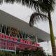 Photo of workers stringing wire outside of the Hard Rock Stadium in Miami Gardens