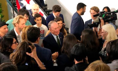 Photo of Michael Blolomberg greeting supporters and media