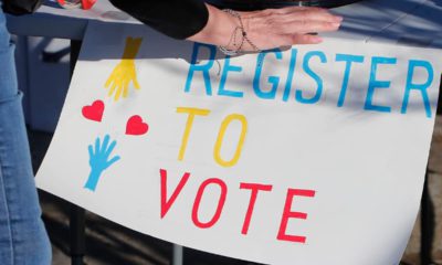 Photo of a Register to Vote sign