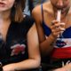 Photo of two women vaping at a party in Los Angeles