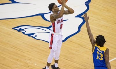 Fresno State's New Williams launches a 3-point shot against San Jose State