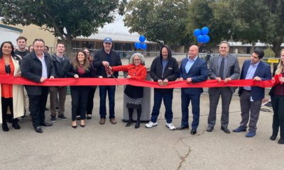 Photo of ribbon cutting for the RH Community Builders Winter Warming Shelter