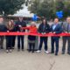 Photo of ribbon cutting for the RH Community Builders Winter Warming Shelter