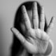 Photo of a girl with her hand to the camera