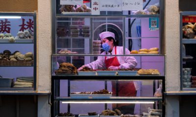 Photo of a chef working near a food display in Beijing