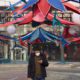 Photo of a man using his phone as he walks in Beijing, China