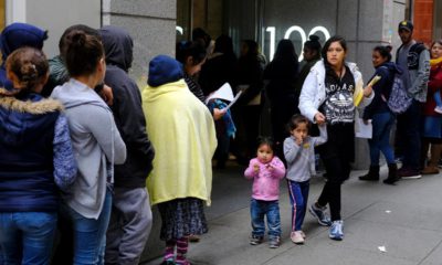 Photo of people outside a U.S. immigration office with numerous courtrooms in San Francisco