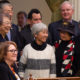 Photo of Japanese Americans who were incarcerated during World War II after the California Assembly passed House Resolution 77