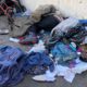 Photo of sleeping people and used needles on the ground in San Francisco