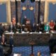 Photo of Chief Justice of the United States John Roberts arriving at the impeachment vote