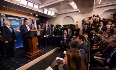Photo of President Donald Trump with Vice President Mike Pence, left, and members of the president's coronavirus task force