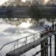 Photo of people trying to catch fish along the Sacramento River in the San Joaquin-Sacramento River Delta, near Courtland, Calif.