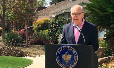 Photo of Fresno mayor Lee Brand at a news conference in front of his home