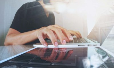 Photo of a woman using a laptop