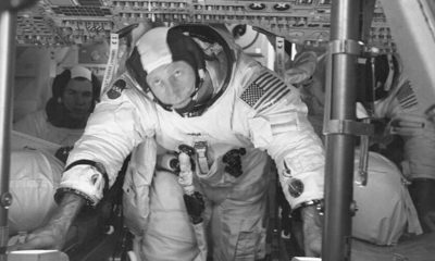 Photo of astronauts Al Worden, center, Dave Scott, left, and Jim Irwin in the Command Module for an altitude chamber test at Cape Canaveral, Fla.