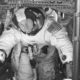 Photo of astronauts Al Worden, center, Dave Scott, left, and Jim Irwin in the Command Module for an altitude chamber test at Cape Canaveral, Fla.