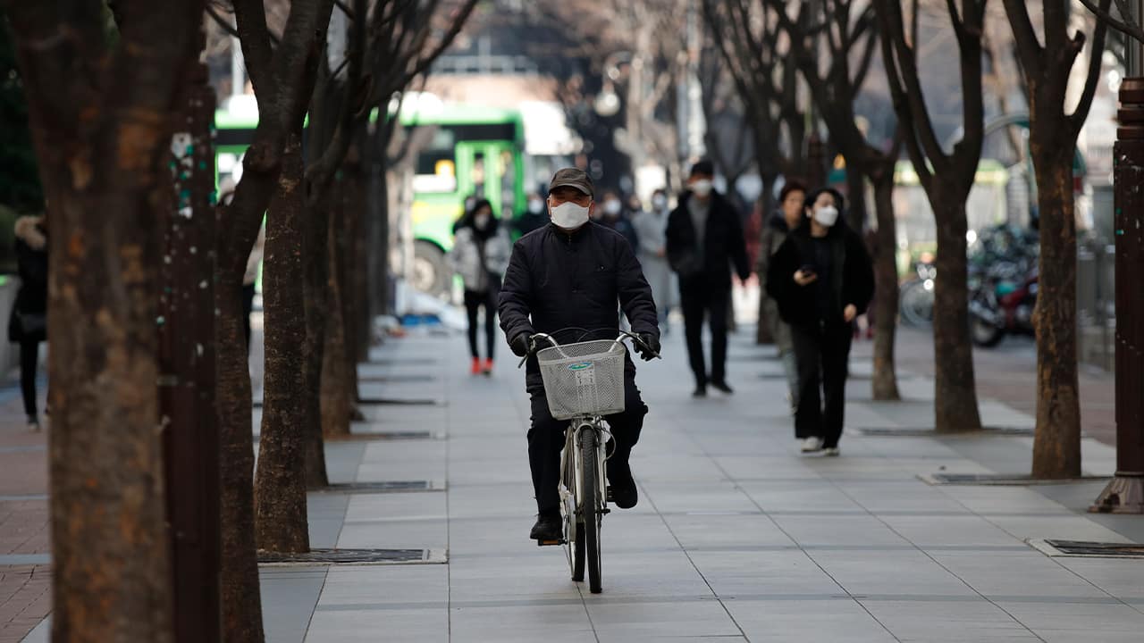 Photo of people wearing face masks to prevent the spread of a new coronavirus in Seoul, South Korea