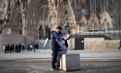 Photo of people taking a photo in Spain