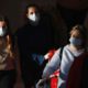 Photo of travelers wearing masks in Tel Aviv, Israel